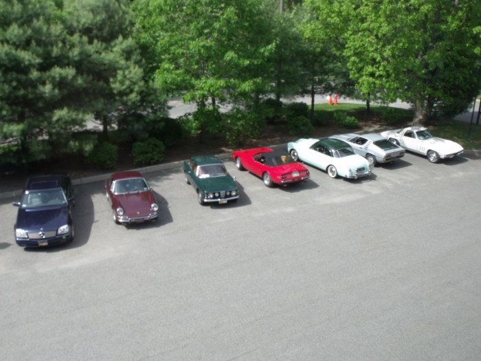 Rally cars from a second floor window.