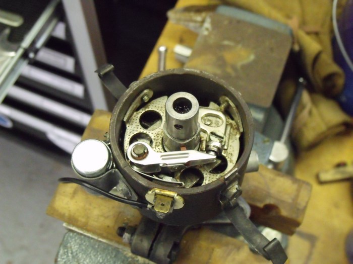 Service book recommends distributor removal for points replacement