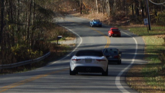 American, German, and British machinery sweep through the curves